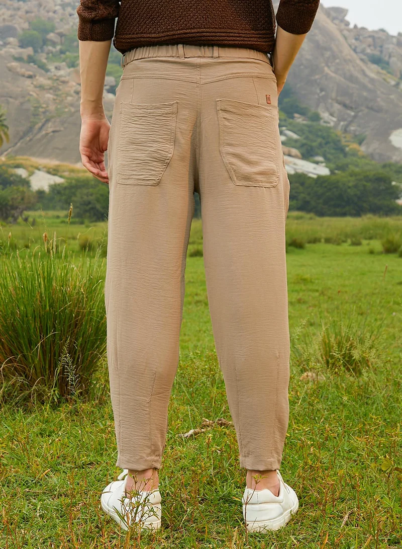 CAHOOT  Men's Khaki Beige Solid Tapered Trousers For Casual Wear | Low-Rise | 4 Pockets | Drawstring Closure | Trousers Crafted With Comfort Fit For Everyday Wear for Men | Best Price UAE